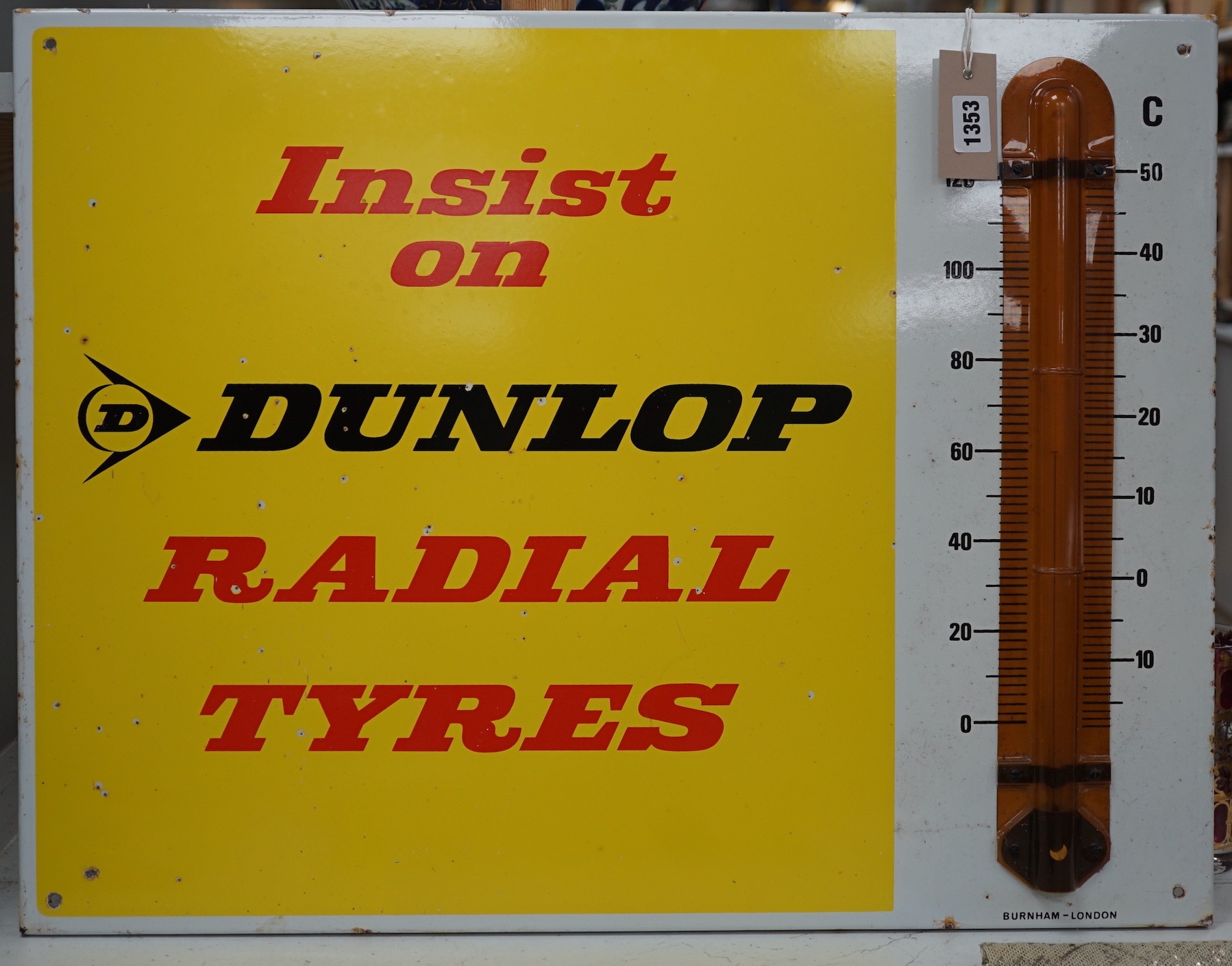 An enamel sign, Insist on Dunlop Radial Tyres, 66.5cms wide x 51cms high